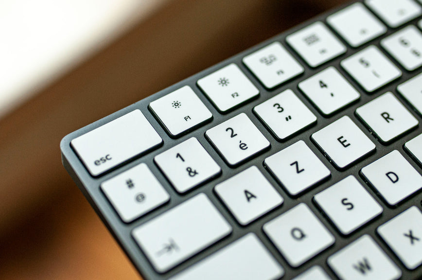 White keyboard stickers presented on desktop keyboard